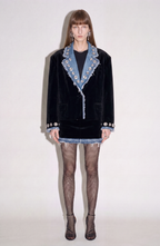 Women's black blazer with blue denim lapels, silver embellishments and long sleeves