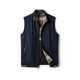 Men's sleeveless zip vest with stand collar, angled zipped pockets and checked lining