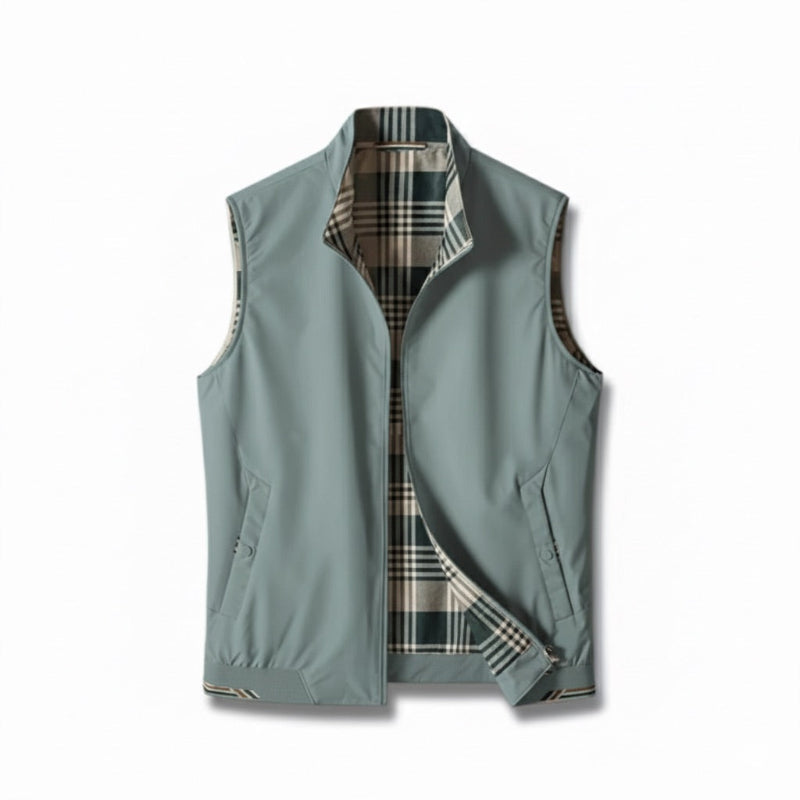 Men's sleeveless zip vest with stand collar, angled zipped pockets and checked lining