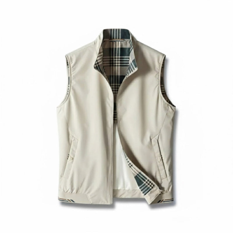 Men's sleeveless zip vest with stand collar, angled zipped pockets and checked lining