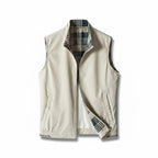 Men's sleeveless zip vest with stand collar, angled zipped pockets and checked lining