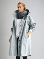 Women's long hooded trench coat with button front and gathered cuffs