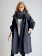 Women's long hooded trench coat with button front and gathered cuffs