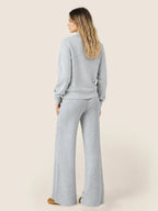 Women's grey ribbed cardigan with collar and front zip fastening