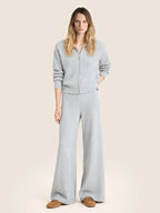 Women's grey ribbed cardigan with collar and front zip fastening
