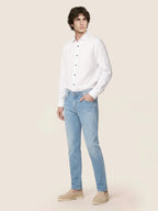 Men's light blue straight leg jeans with five-pocket styling