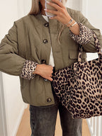 Women's quilted jacket with leopard-print cuffs and button front