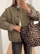 Women's quilted jacket with leopard-print cuffs and button front