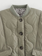 Women's quilted jacket with leopard-print cuffs and button front
