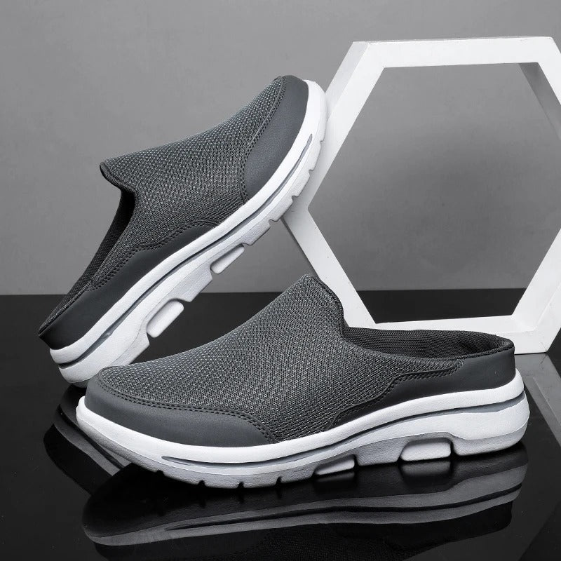 Unisex slip-on sneaker slides with textured upper and white segmented sole