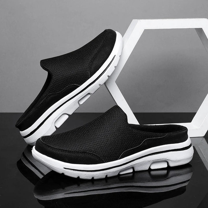 Unisex slip-on sneaker slides with textured upper and white segmented sole