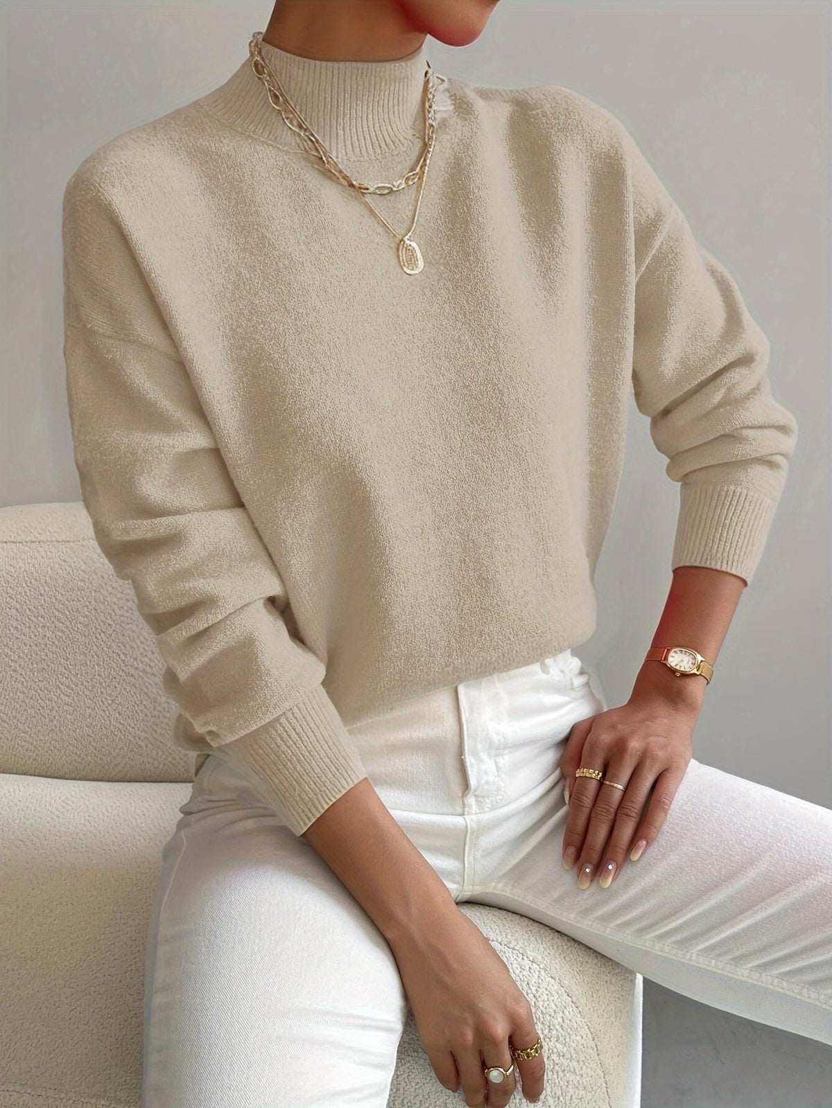 Women's plain mock neck sweater with long sleeves and ribbed trims