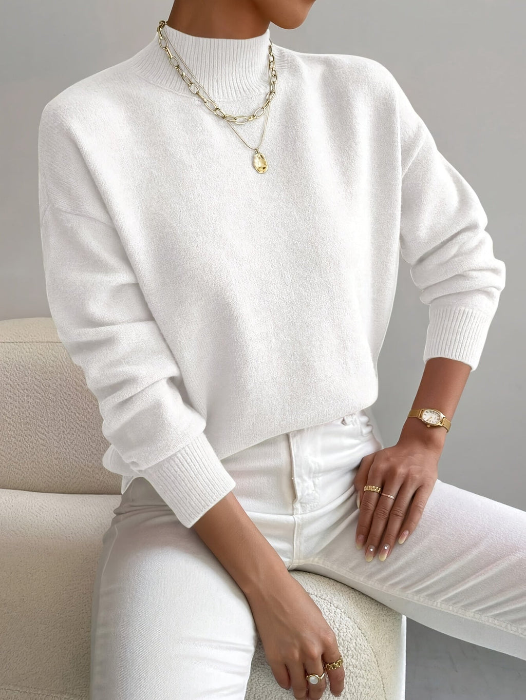 Women's plain mock neck sweater with long sleeves and ribbed trims