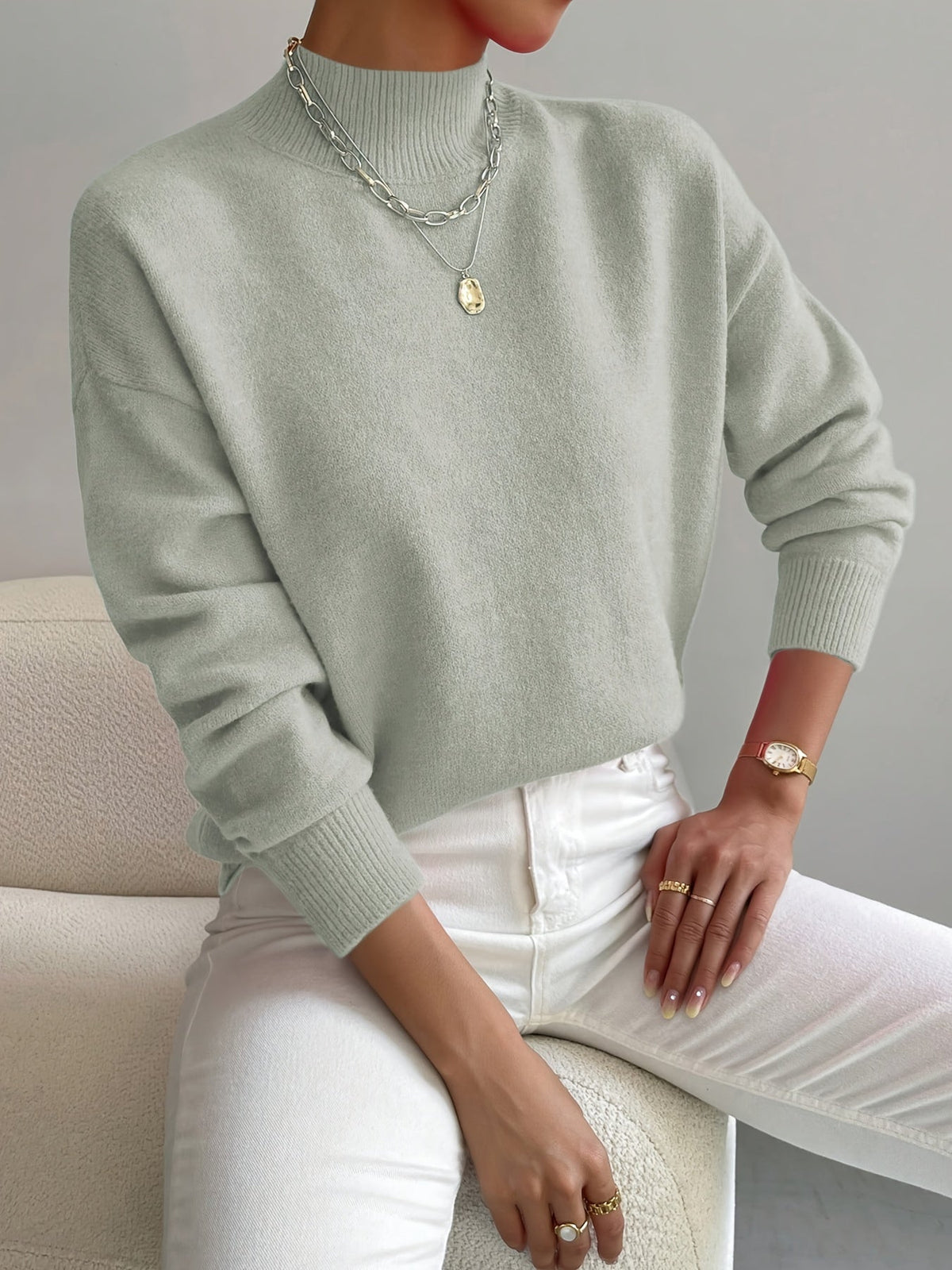 Women's plain mock neck sweater with long sleeves and ribbed trims