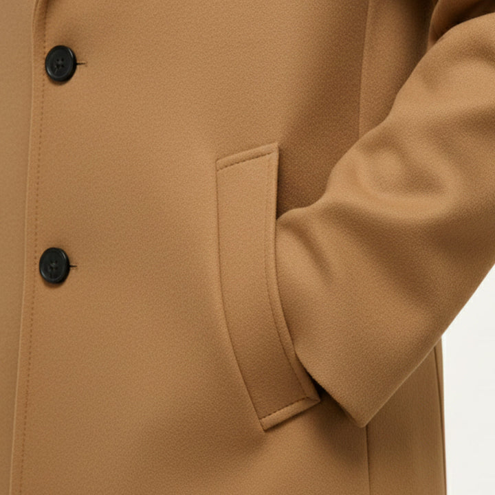 Men's long button-front overcoat with notched lapels and side pockets