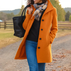 Women's long tailored trench coat with notched lapels, button front and side pockets