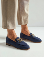 Women's slip-on loafers with gold-tone chain detail and low heel