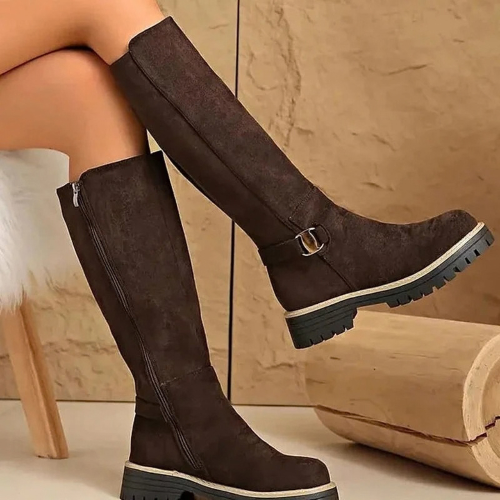 Women's knee-high boots with side zips, buckle details and lugged soles