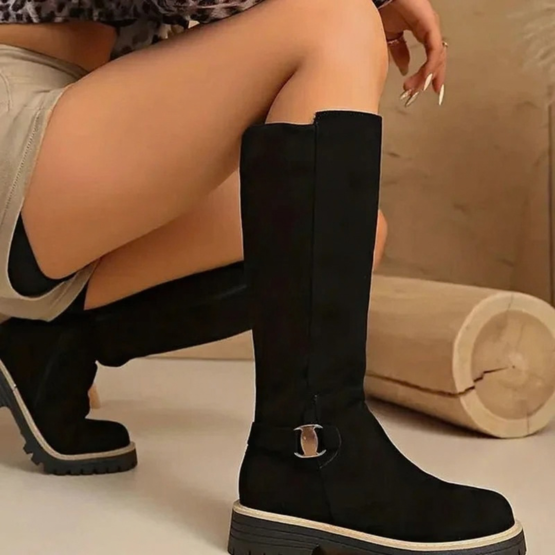 Women's knee-high boots with side zips, buckle details and lugged soles