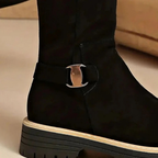 Women's knee-high boots with side zips, buckle details and lugged soles