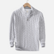 Men's cable knit quarter-zip sweater with stand collar and long sleeves