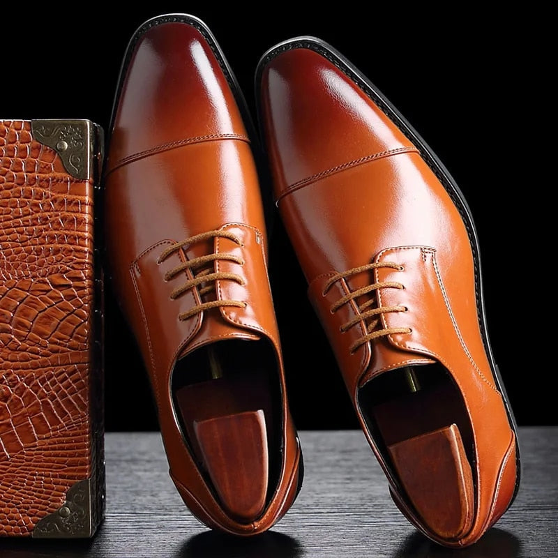 Men's cap toe Oxford dress shoes with lace-up front