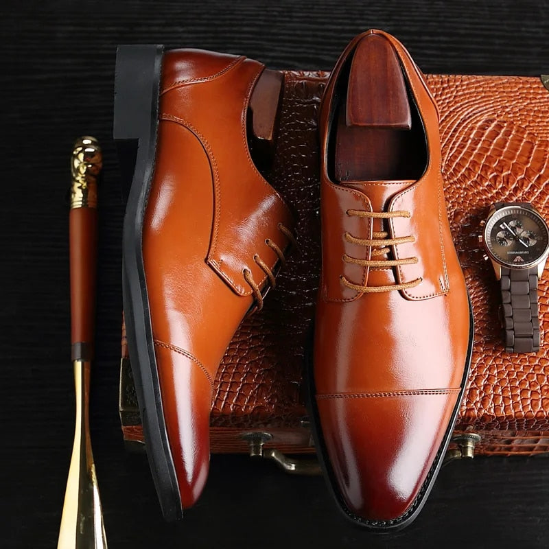 Men's cap toe Oxford dress shoes with lace-up front