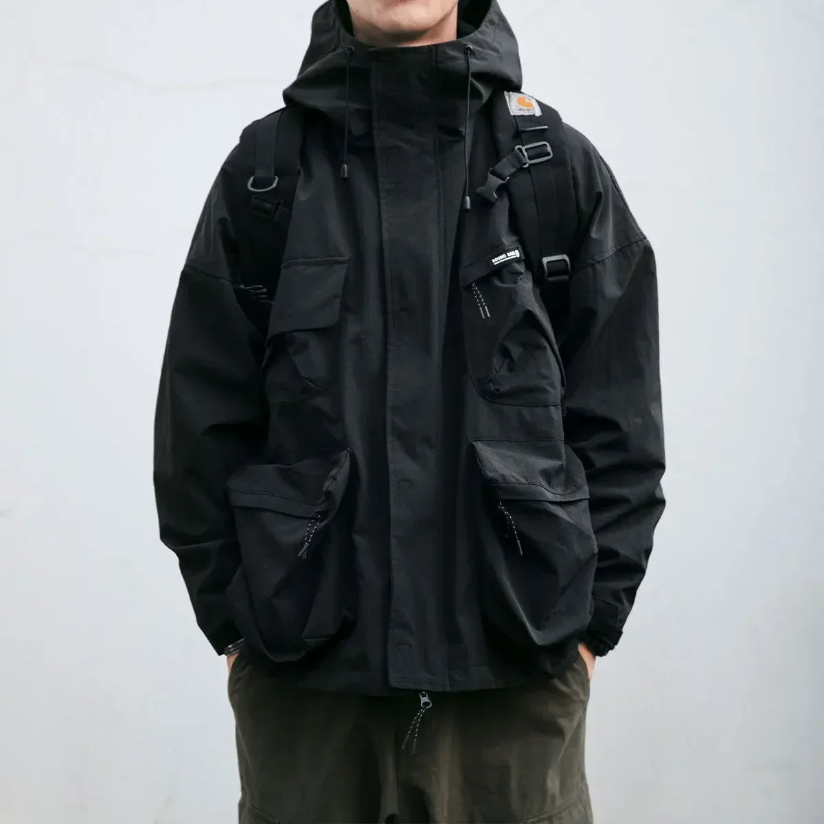 Men's hooded multi-pocket windbreaker jacket with zip front
