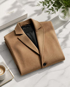Men's long button-front overcoat with notched lapels and side pockets