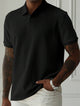 Men's textured short-sleeve polo shirt with chevron knit pattern