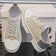 Low-top vintage lace-up sneakers with contrast toe cap