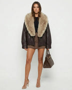 Women's brown cropped jacket with a large beige fur-effect collar and long sleeves