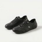 Low-profile lace-up trainers with rounded toes, stitched panels and textured soles