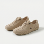 Low-profile lace-up trainers with rounded toes, stitched panels and textured soles