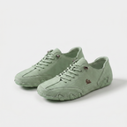 Low-profile lace-up trainers with rounded toes, stitched panels and textured soles