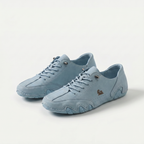 Low-profile lace-up trainers with rounded toes, stitched panels and textured soles