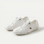 Low-profile lace-up trainers with rounded toes, stitched panels and textured soles