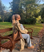 Women's long double-breasted trench coat with notched lapels
