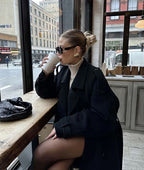 Women's long double-breasted trench coat with notched lapels