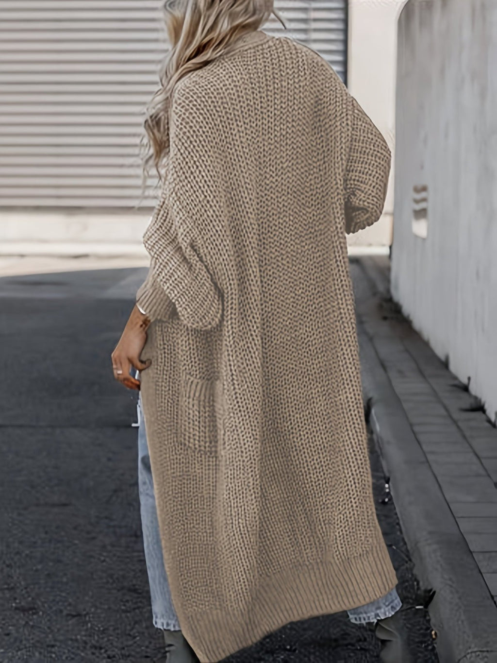 Women's longline open front textured knit cardigan with pockets and balloon sleeves
