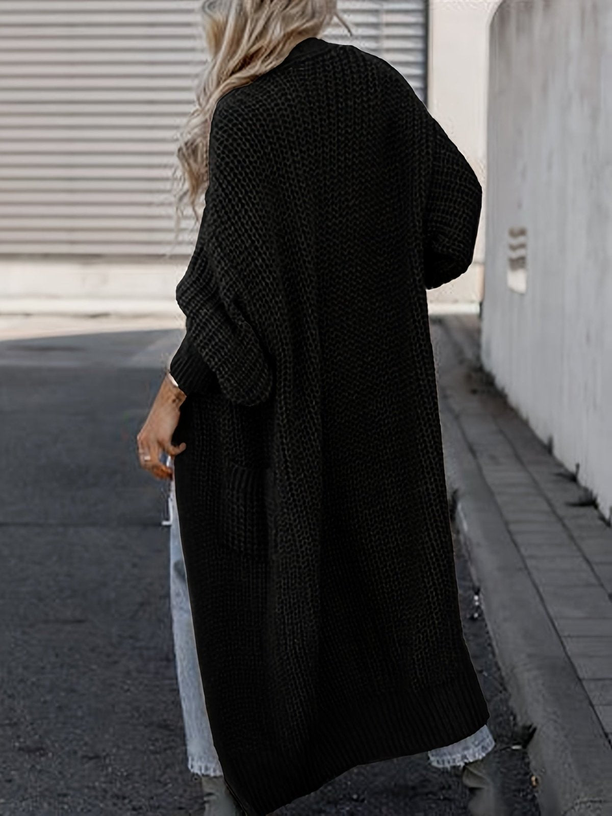 Women's longline open front textured knit cardigan with pockets and balloon sleeves