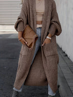 Women's longline open front textured knit cardigan with pockets and balloon sleeves