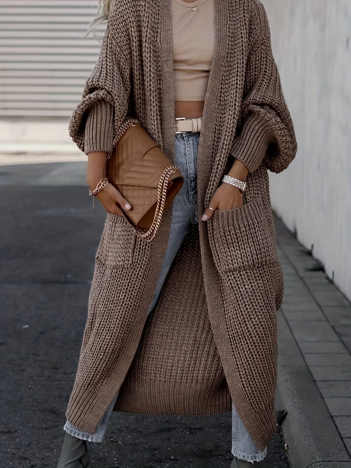 Women's longline open front textured knit cardigan with pockets and balloon sleeves
