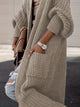 Women's longline open front textured knit cardigan with pockets and balloon sleeves