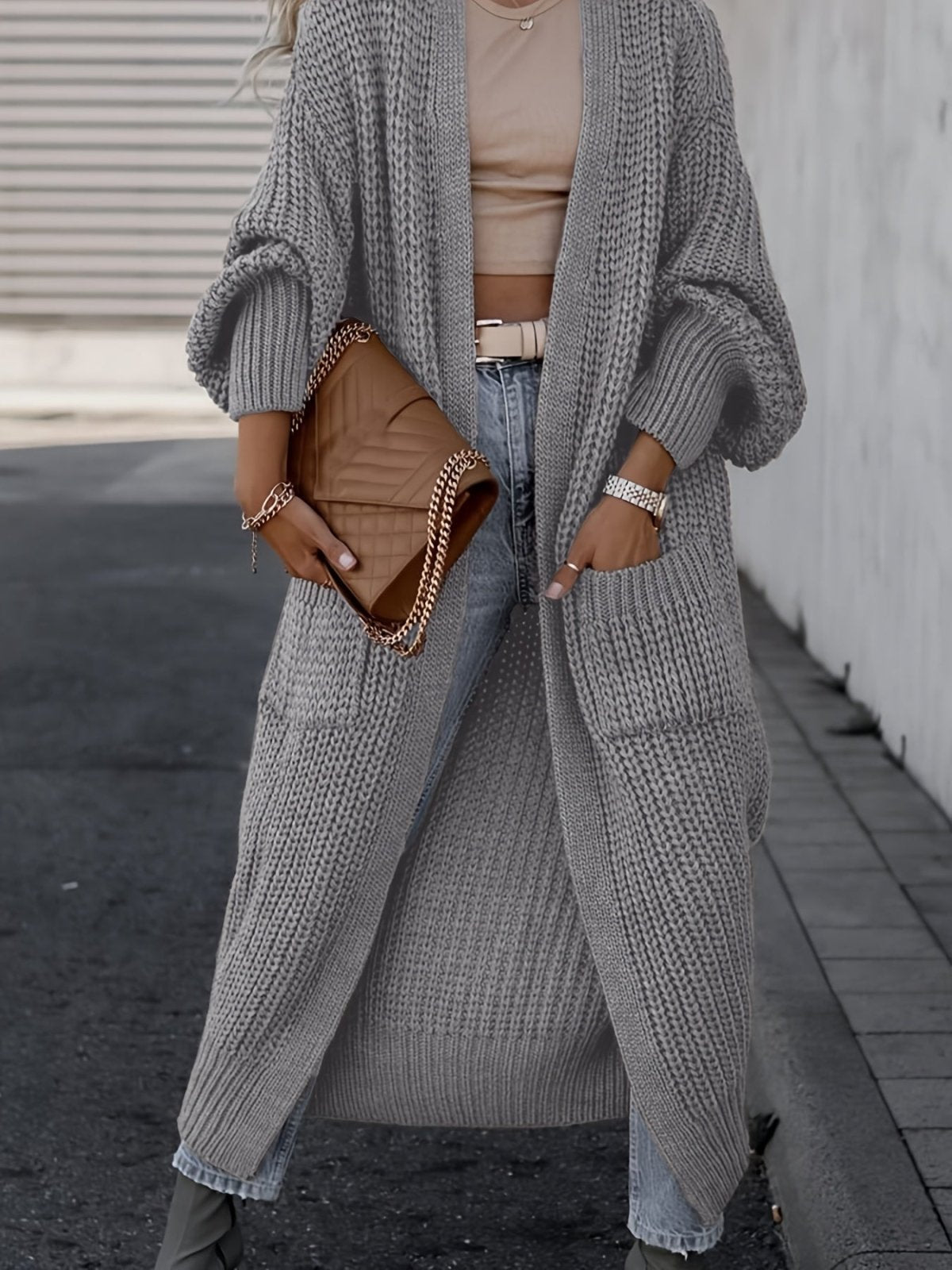 Women's longline open front textured knit cardigan with pockets and balloon sleeves