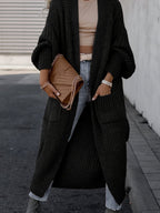 Women's longline open front textured knit cardigan with pockets and balloon sleeves