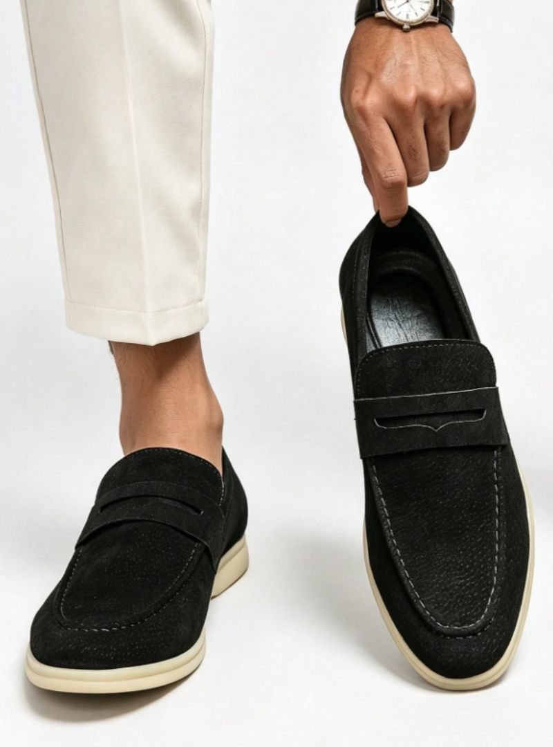 Men's plain penny loafers with moc toe stitching and low heels