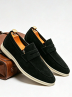 Men's plain penny loafers with moc toe stitching and low heels