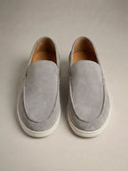 Men's plain slip-on loafers with moc toe stitching and flat soles