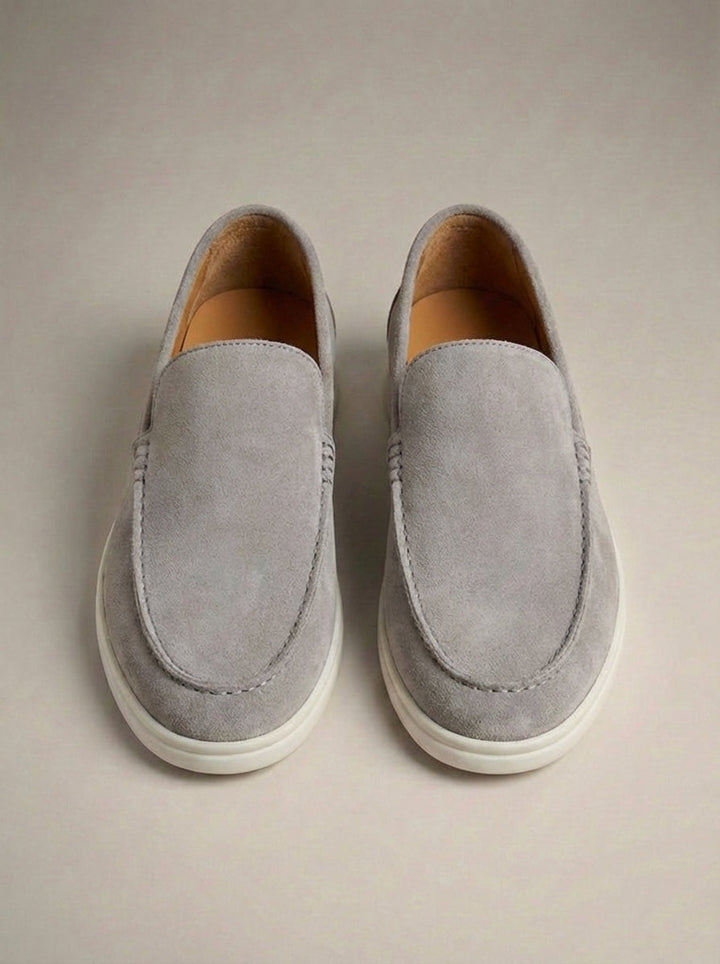 Men's plain slip-on loafers with moc toe stitching and flat soles